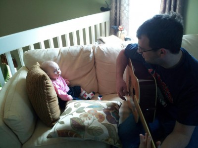 Hailey has taken an interest in Dan's guitar-playing.  