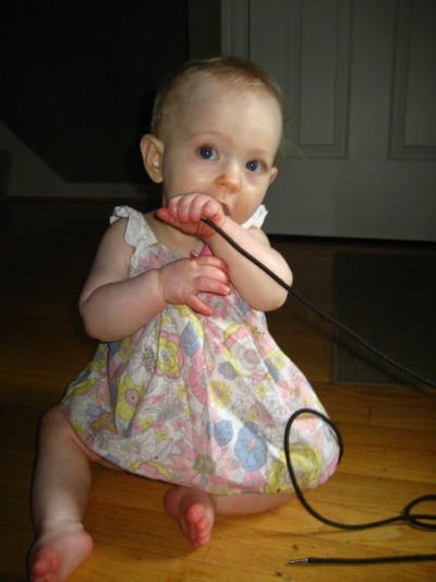 Posing in Mama's favorite outfit.  This is the only photo out of about 20 in which Hailey is halfway still and looking at the camera.  There's no stopping this girl!